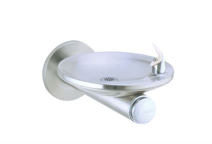A silver colored wash basin holder with tap